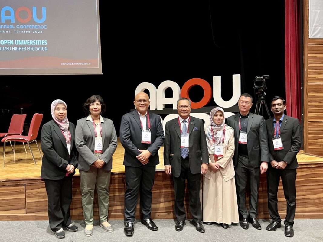 Open University Malaysia awards celebration at AAOU Conference featuring gold and silver winning researchers presenting innovative educational technology research